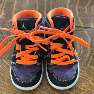 Nike Black and Orange High-Top Sneakers for Basketball